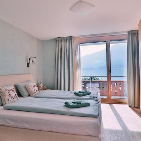 Seehaus / lake view apartment Iseltwald Buitenkant foto